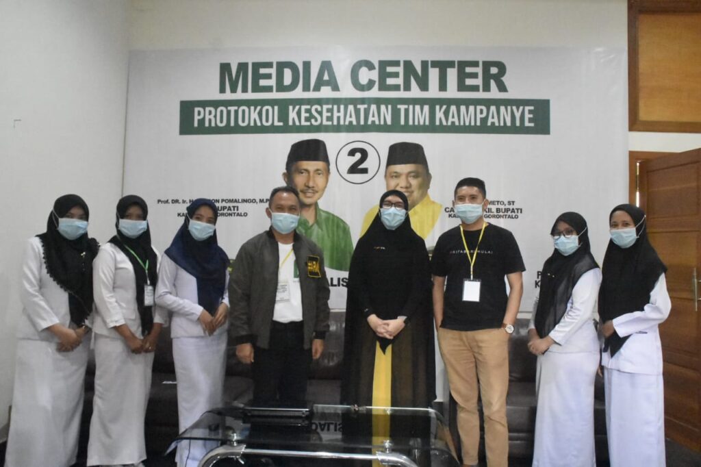 Media Center Protokol Kesehatan Tim Kampanye Paslon Nelson Pomalingo-Hendra S. Hemeto