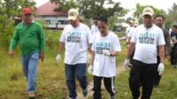 Momen HPSN, Nelson Pomalingo Ikut Bersihkan Sampah di Danau Limboto
